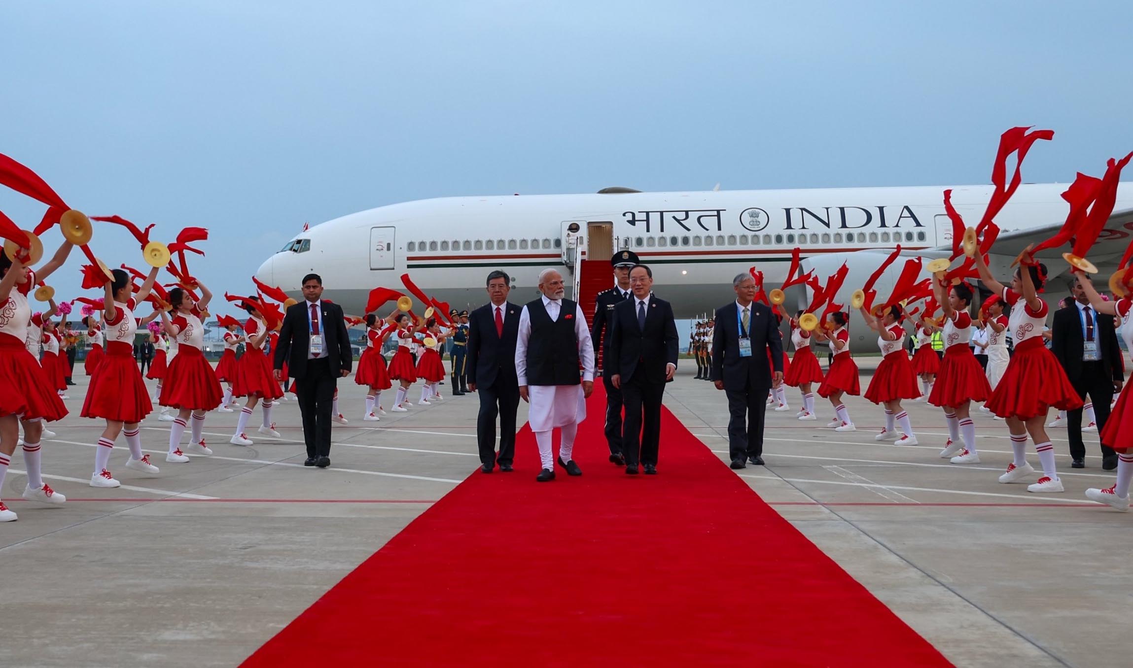 PM Narendra Sri Modi lands in Binhai after seven years